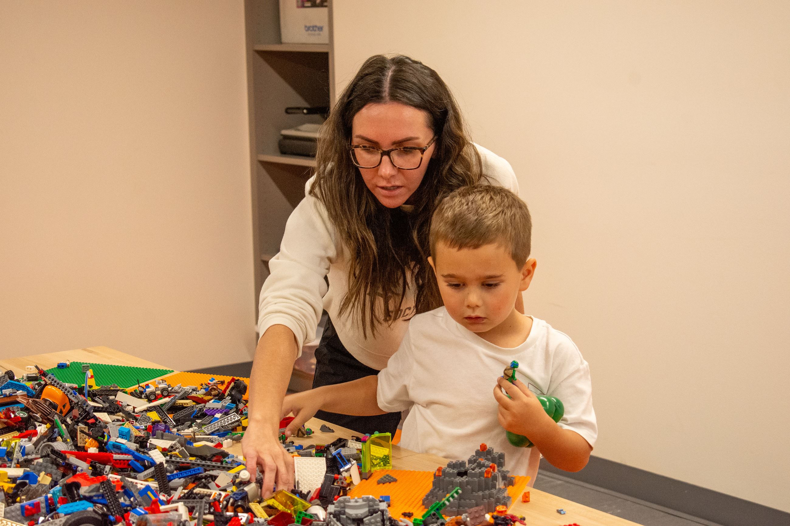 Adult and Child Building with Legos