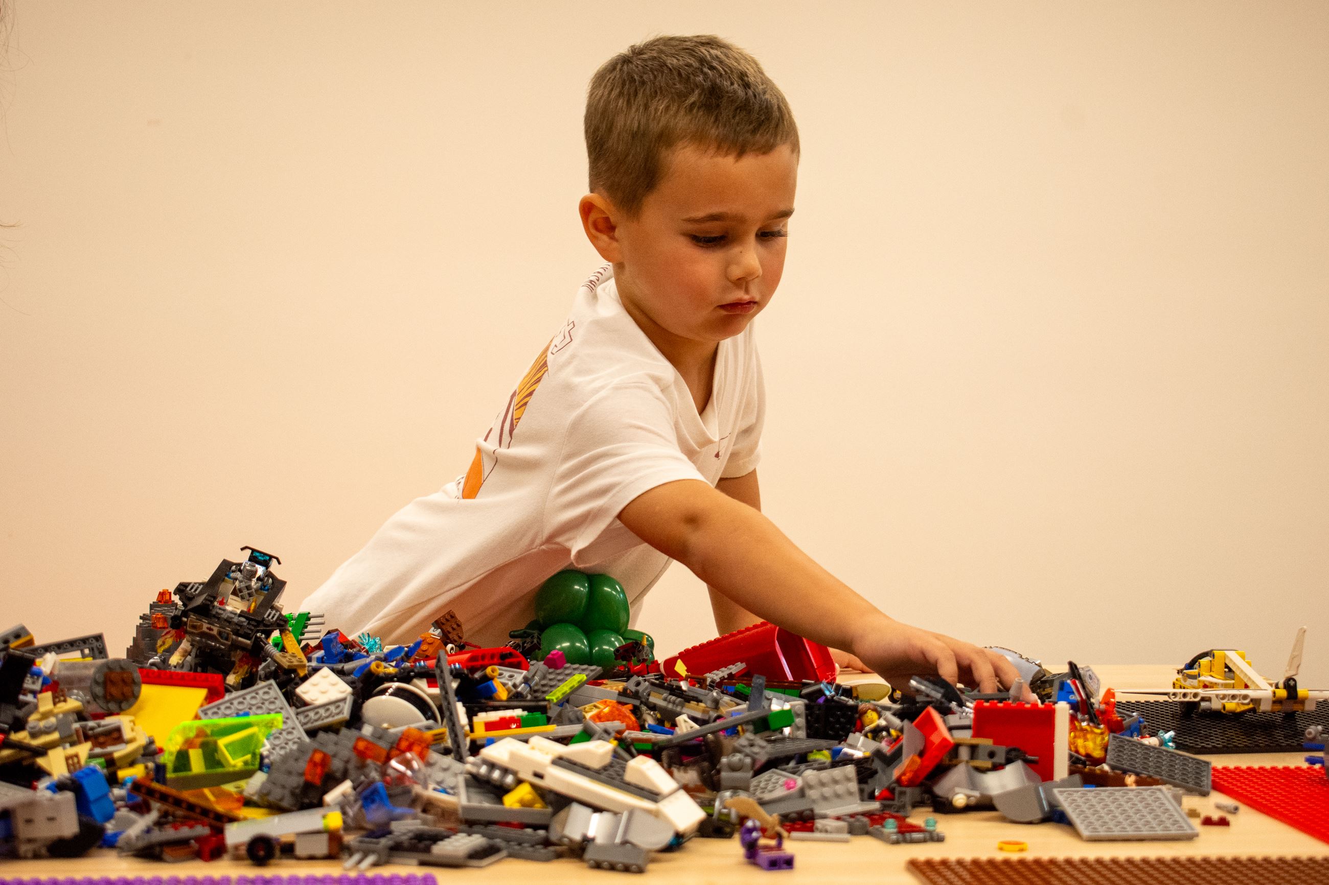 Child Building with Legos